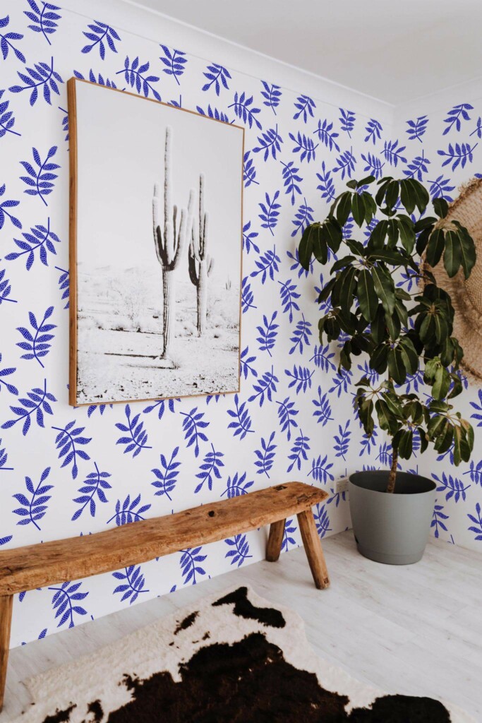 Scandinavian style entryway decorated with Bold Blue leaf peel and stick wallpaper