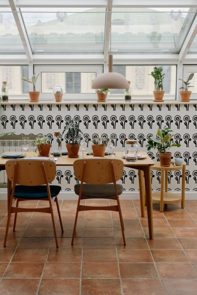 MId-century modern style dining room on a balcony decorated with Bold poppy floral peel and stick wallpaper