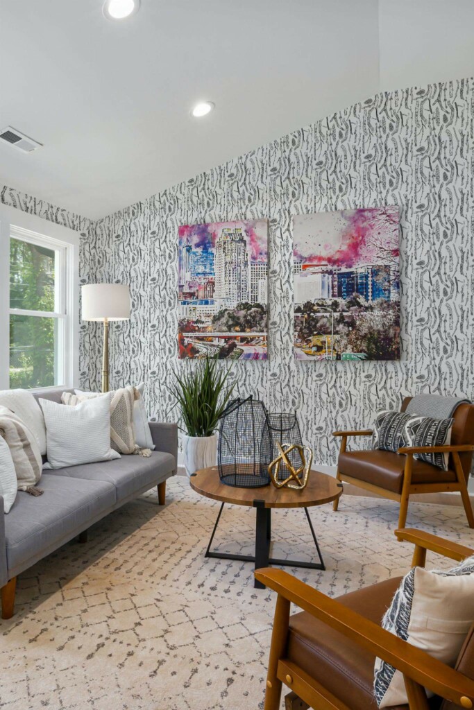 Mid-century modern style living room decorated with Branches peel and stick wallpaper and colorful funky artwork