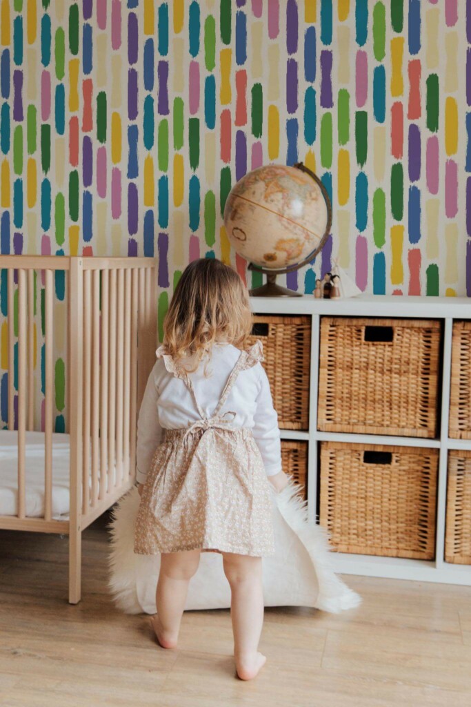 Gender neutral style kids room decorated with Bright brush strokes peel and stick wallpaper