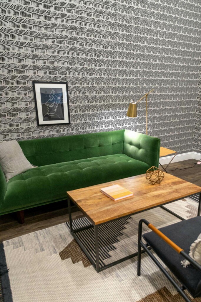 Mid-century modern living room decorated with Brush stroke bent lines peel and stick wallpaper and forest green sofa