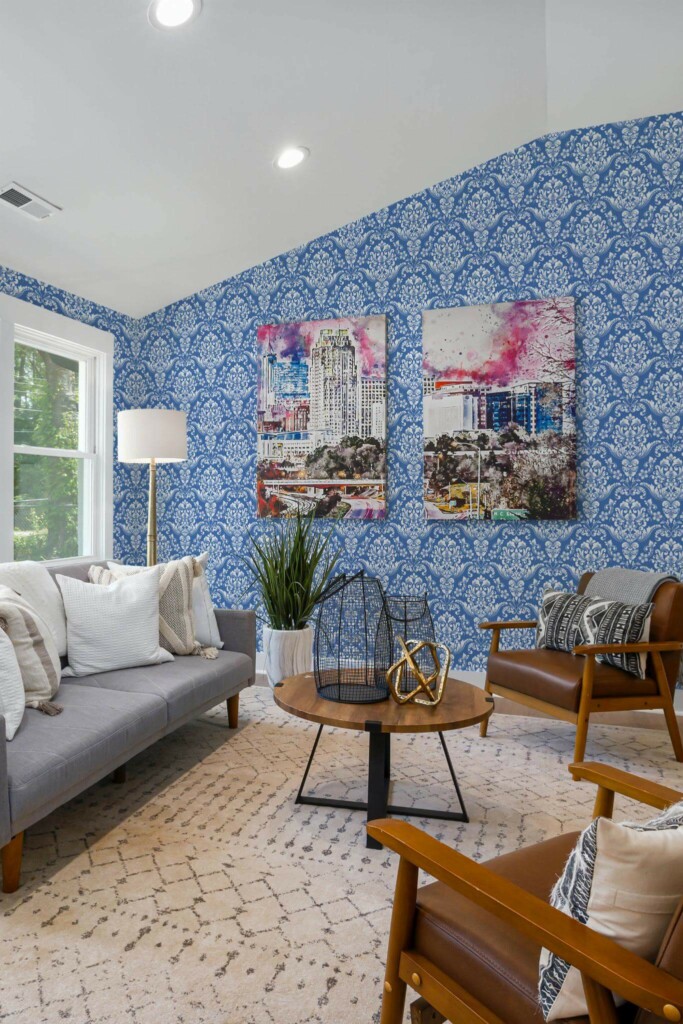 Mid-century modern style living room decorated with Classic damask peel and stick wallpaper and colorful funky artwork