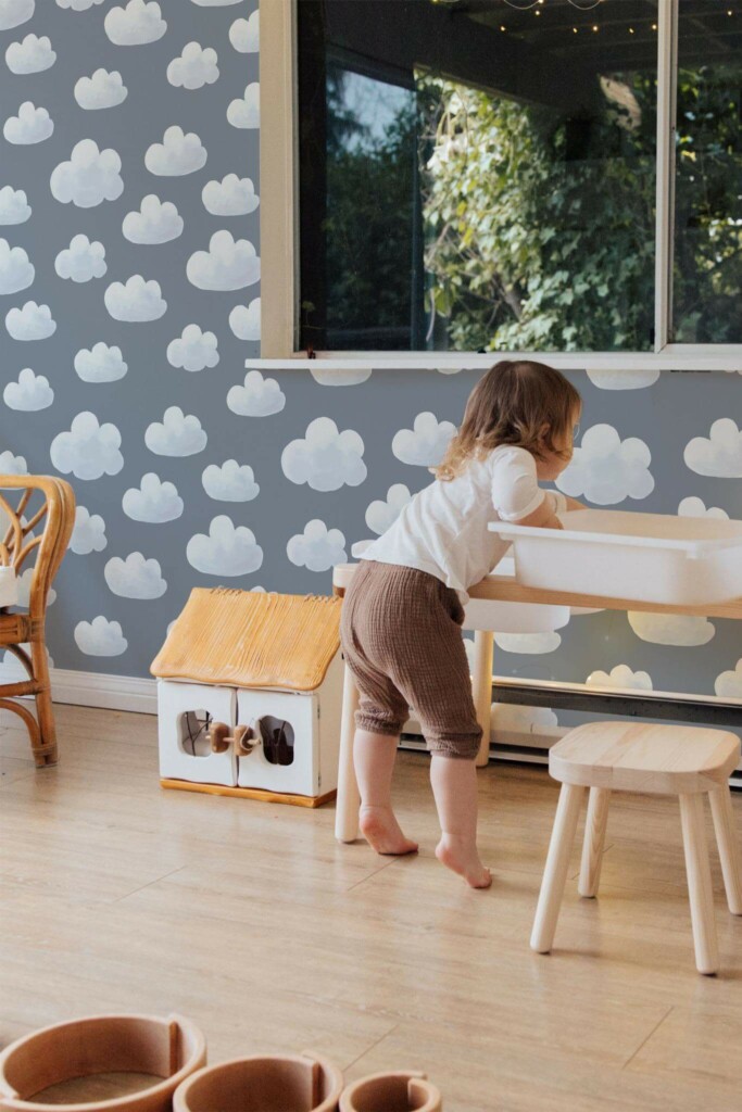 Bohemian style kids room decorated with Cloud peel and stick wallpaper