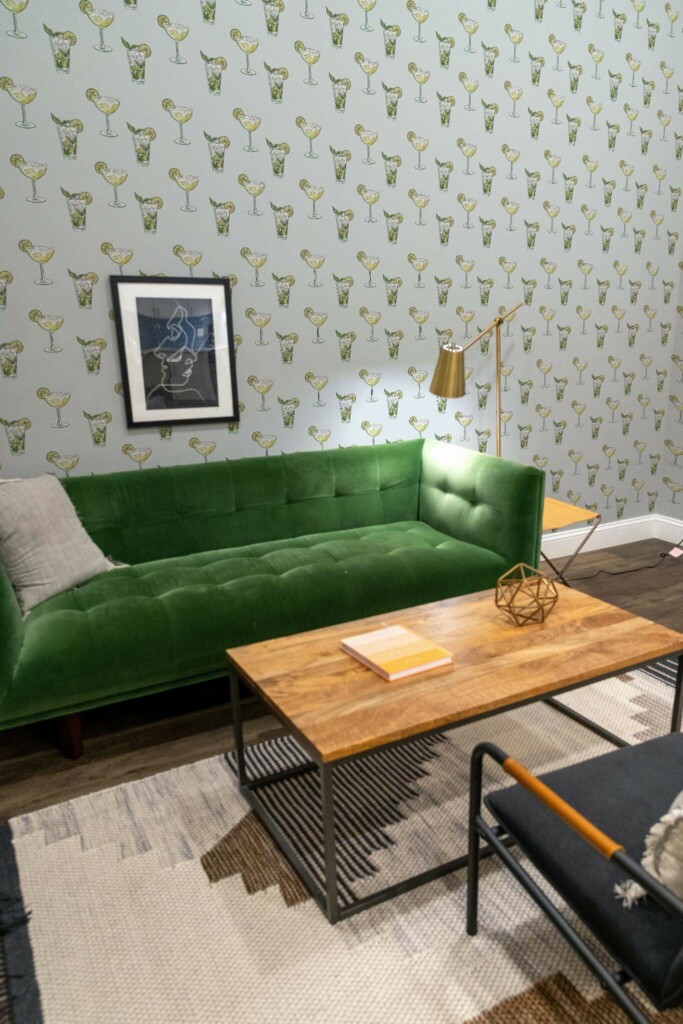 Mid-century modern living room decorated with Cocktails peel and stick wallpaper and forest green sofa