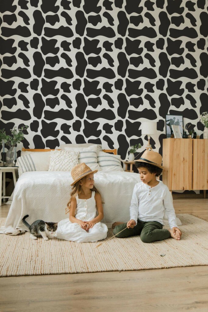 Scandinavian style bedroom decorated with Cow Animal print peel and stick wallpaper