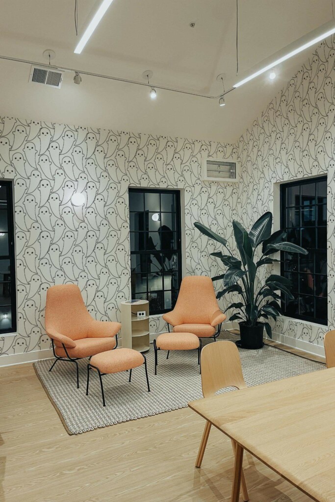 Minimal style living room decorated with Cute aesthetic ghosts peel and stick wallpaper and mid-century style chairs