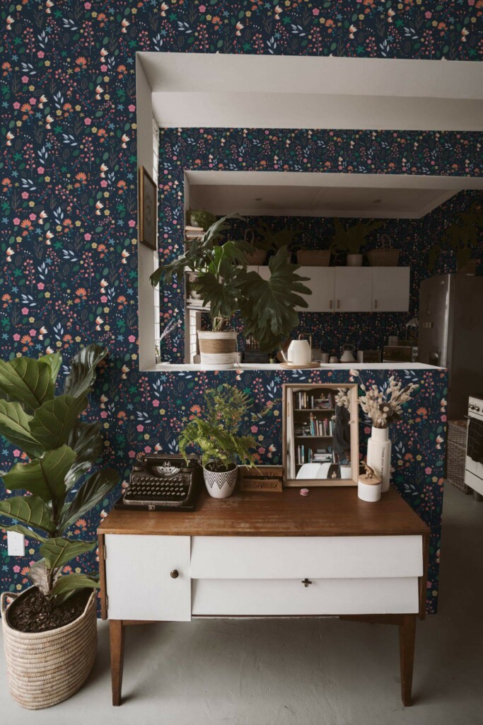 Boho style living room and kitchen decorated with Dark scandinavian floral peel and stick wallpaper and green plants