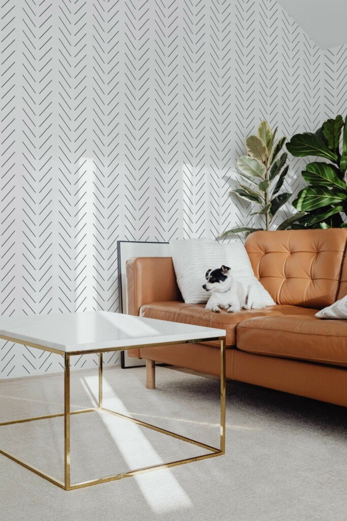 Mid-century modern style living room with dog on a sofa decorated with Delicate Herringbone peel and stick wallpaper