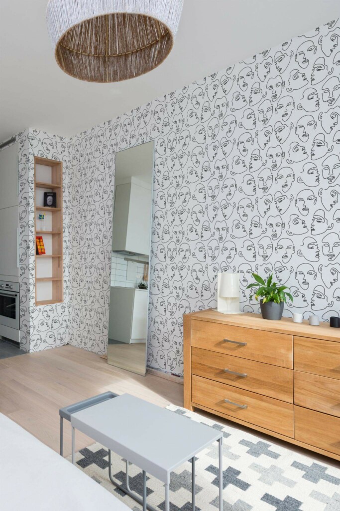 Scandinavian style small apartment decorated with Face line art peel and stick wallpaper