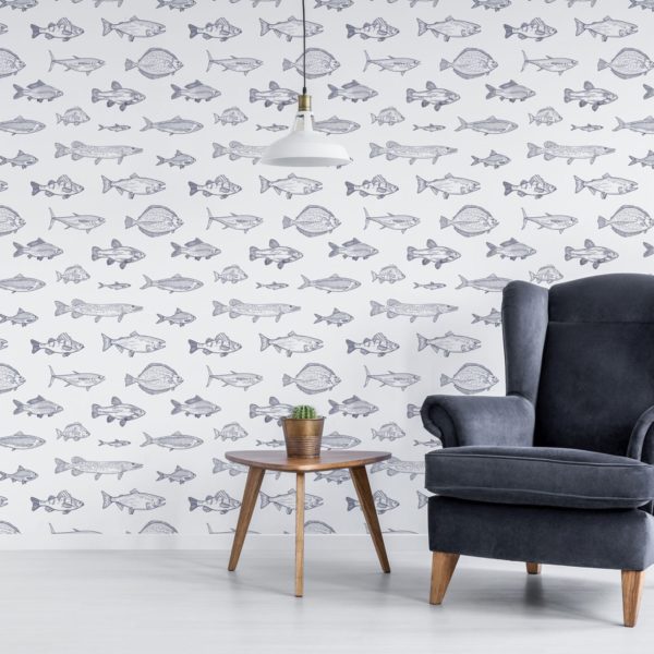 fish wallpaper on wall behind chair