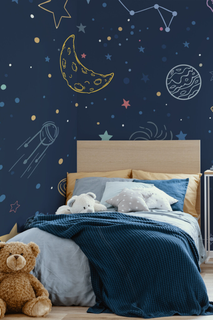 Fancy Walls removable wall mural with blue fun galaxy print and floating planetary elements