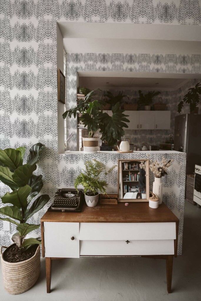 Boho style living room and kitchen decorated with Gray Animal print peel and stick wallpaper and green plants