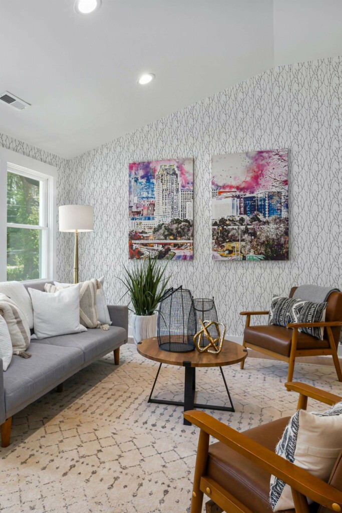 Mid-century modern style living room decorated with Gray branch peel and stick wallpaper and colorful funky artwork