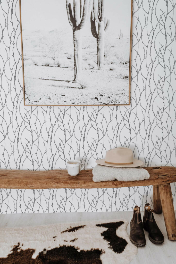Scandinavian style entryway decorated with Gray branch peel and stick wallpaper