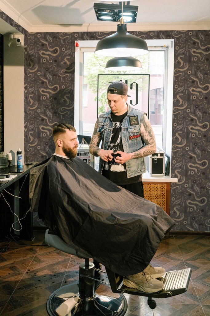 Fancy Walls removable wallpaper in gray Halloween pattern for barber shop walls. Gothic Serpent wallpaper peel and stick or non-pasted