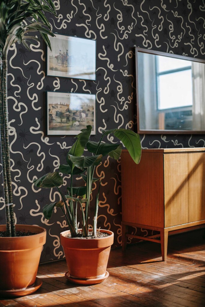 Fancy Walls removable wallpaper with gray skull design for accent wall. Snakes and Spiders wallpaper peel and stick or non-pasted