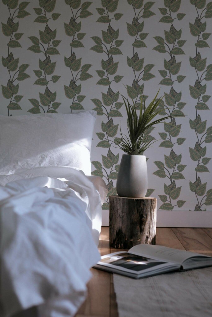 Minimal scandinavian style bedroom decorated with Green and beige leaf peel and stick wallpaper