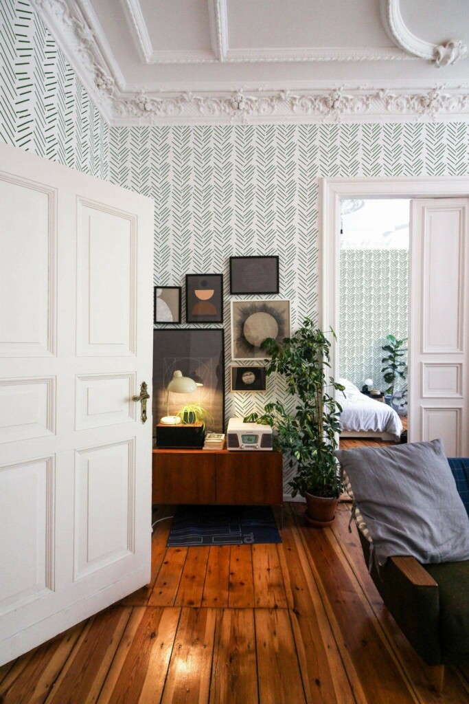Mid-century modern luxury style living room and bedroom decorated with Green herringbone peel and stick wallpaper
