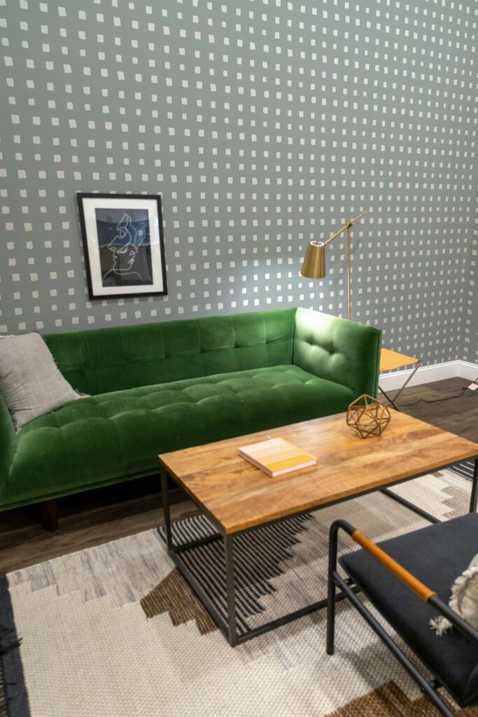 Mid-century modern living room decorated with Green Plaid peel and stick wallpaper and forest green sofa
