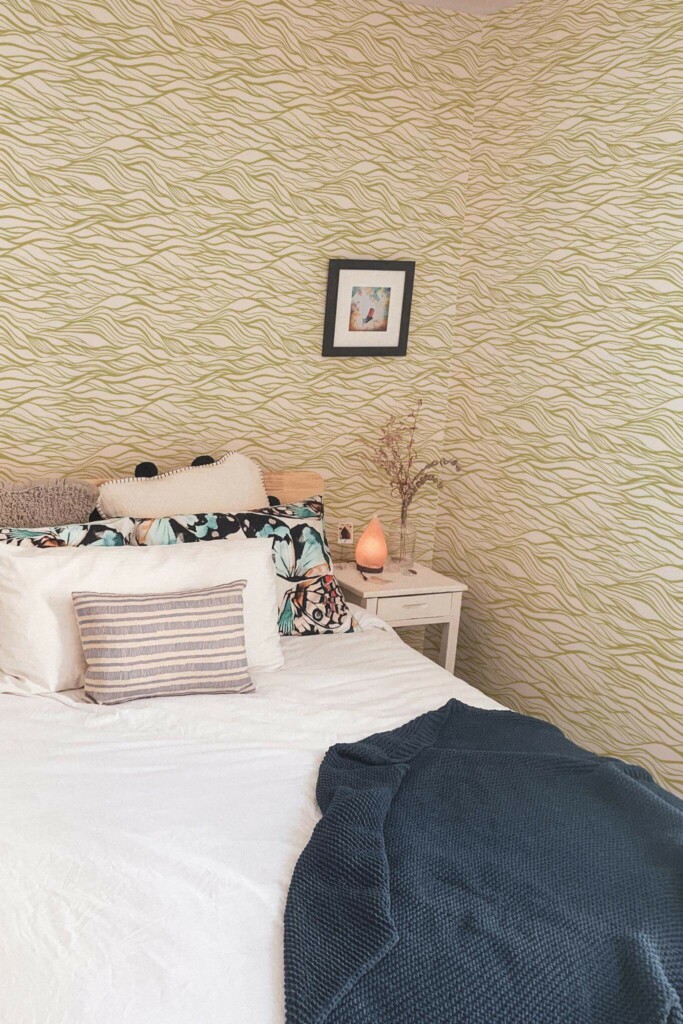 Minimal boho style bedroom decorated with Green waves peel and stick wallpaper