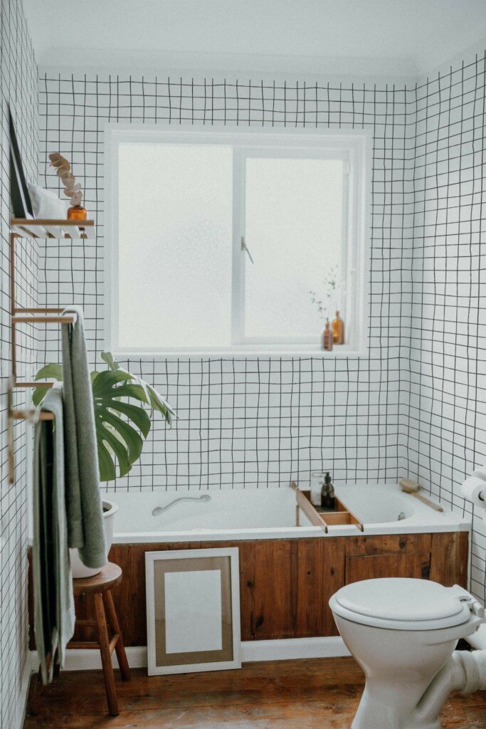 Boho farmhouse style bathroom decorated with Grid peel and stick wallpaper