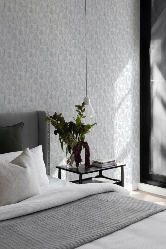 Scandinavian style bedroom decorated with Hand drawn leaves peel and stick wallpaper
