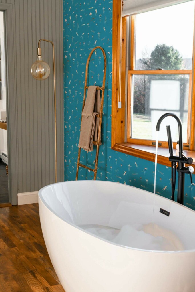 Mid-century modern style bathroom decorated with Happy swimmers peel and stick wallpaper