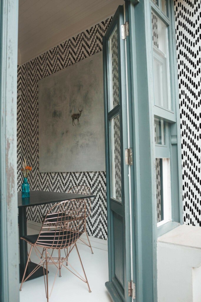Minimal coastal style cafe decorated with Ikat chevron peel and stick wallpaper