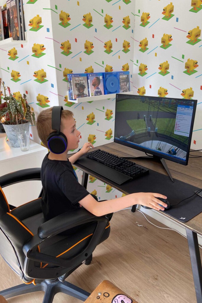Fancy Walls peel and stick wallpaper with yellow isometric ducks