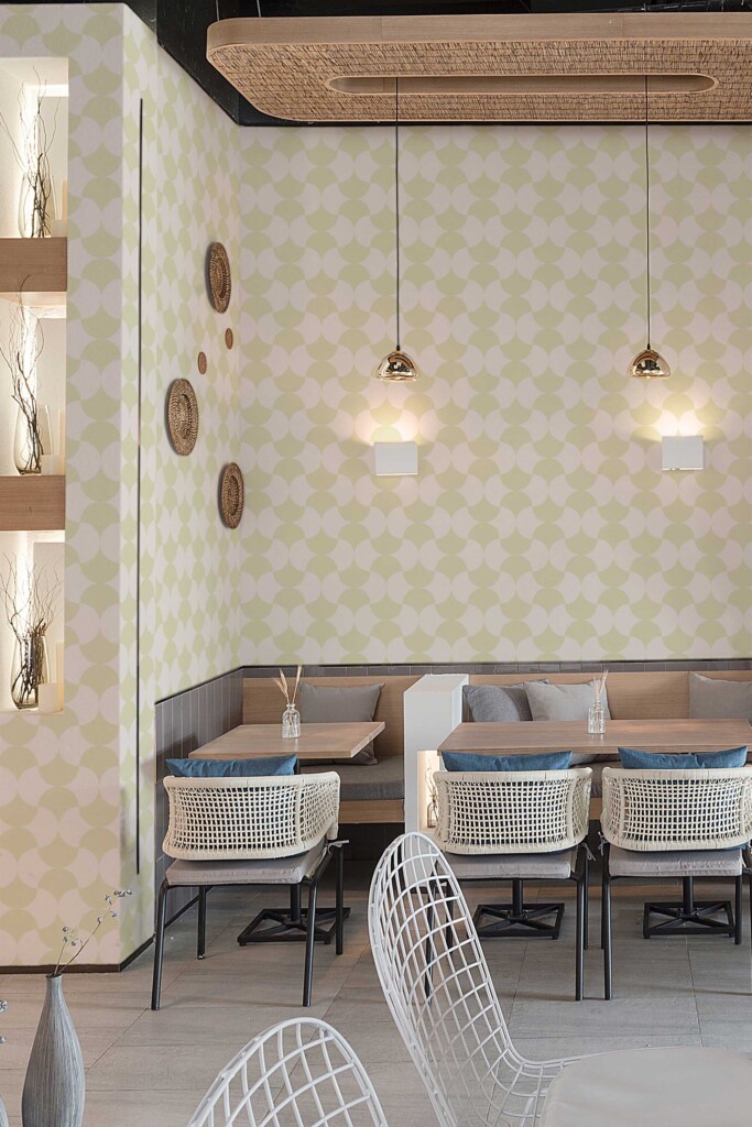Cozy café booth seating area styled with Cozy Coffee Shop Classic wallpaper. The repeating geometric pattern adds a subtle vintage aesthetic, creating a welcoming atmosphere perfect for casual dining and conversation.