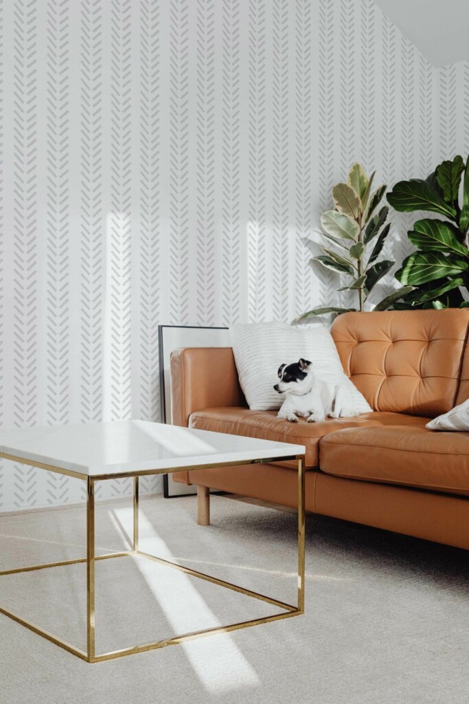Mid-century modern style living room with dog on a sofa decorated with Line herringbone peel and stick wallpaper