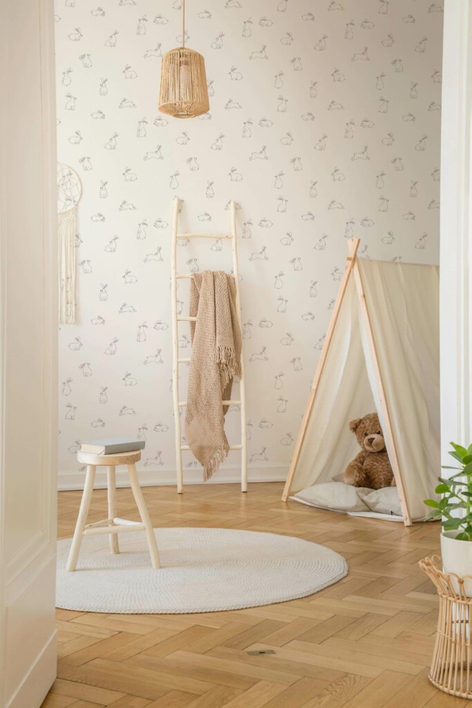 Neutral style nursery decorated with Minimalist bunny peel and stick wallpaper