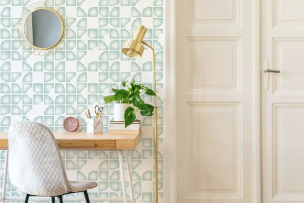 Green abstract geometric shapes stick on wallpaper