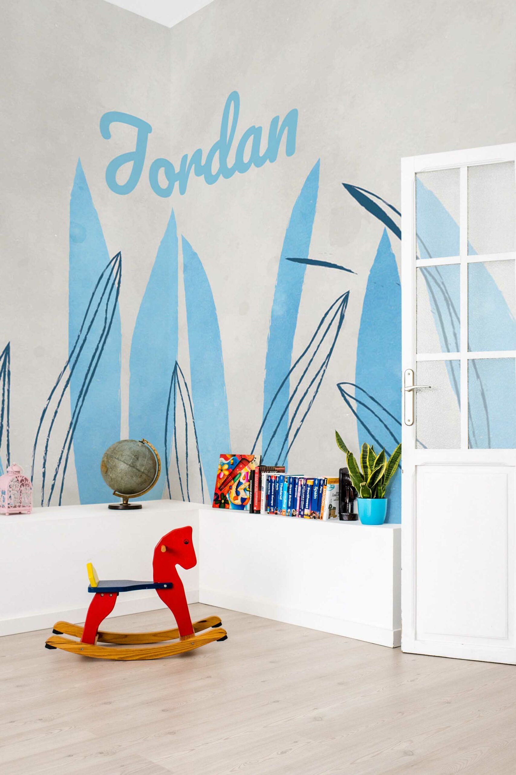 Nursery featuring wall mural peel and stick from Fancy Walls