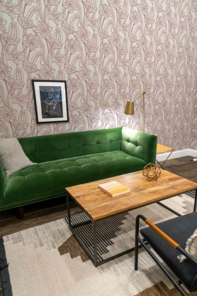 Mid-century modern living room decorated with Narcissus floral peel and stick wallpaper and forest green sofa