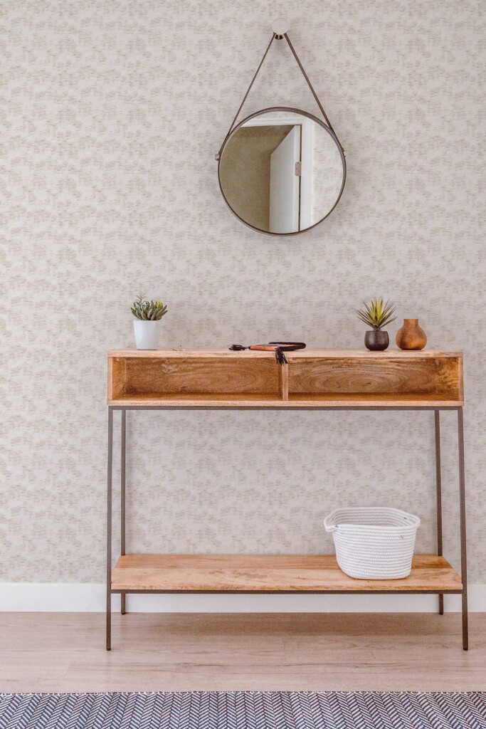 A small vanity setup with a round mirror and wooden furniture placed in front of neutral brushstroke wallpaper. The gray strokes on beige create a balanced and refined look, perfect for modern spa bathrooms, wellness rooms, or minimalist guest spaces.