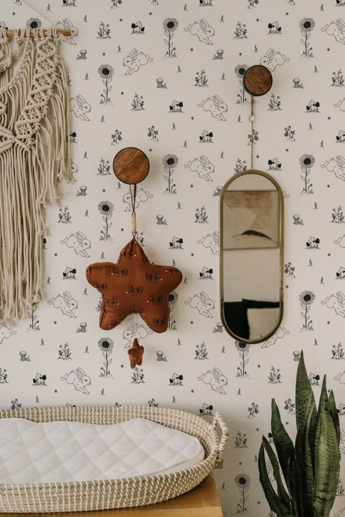 Boho style neutral nursery decorated with Nursery bunny peel and stick wallpaper