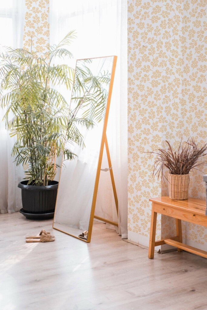 Boho style powder corner decorated with Orange and white leaf peel and stick wallpaper