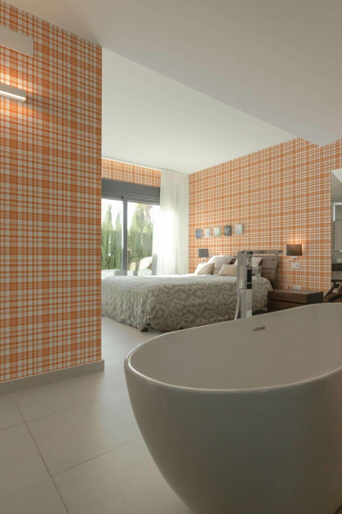 Modern style bedroom with open bathroom decorated with Orange plaid peel and stick wallpaper