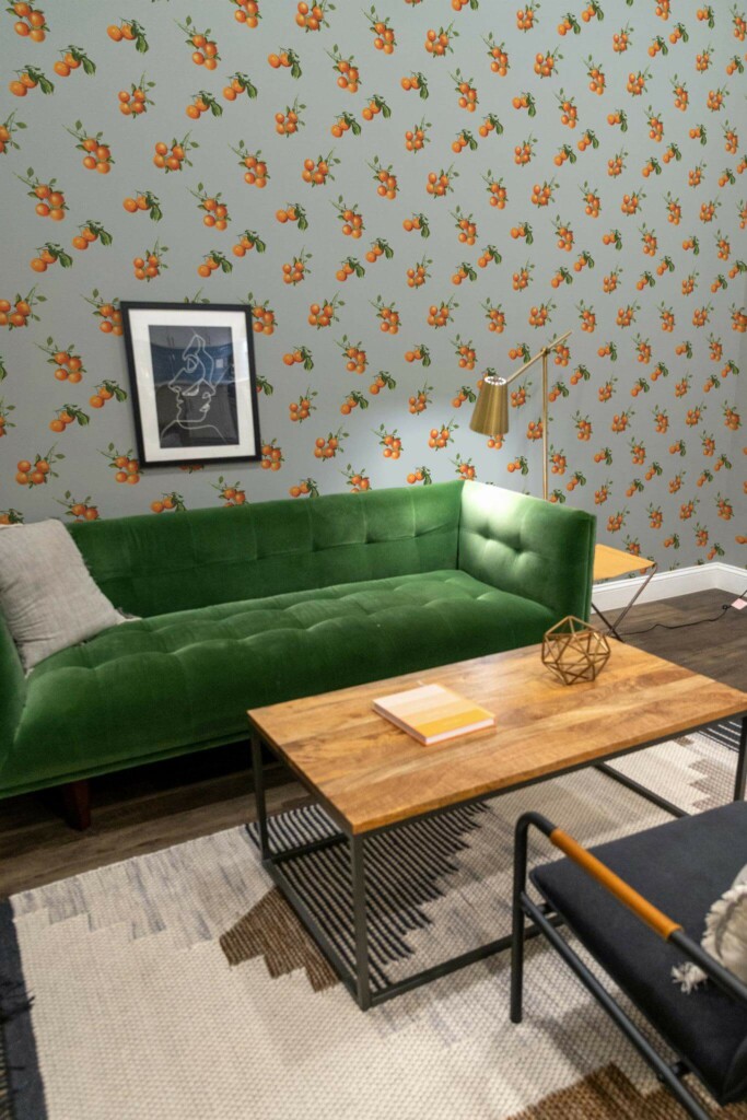 Mid-century modern living room decorated with Oranges peel and stick wallpaper and forest green sofa