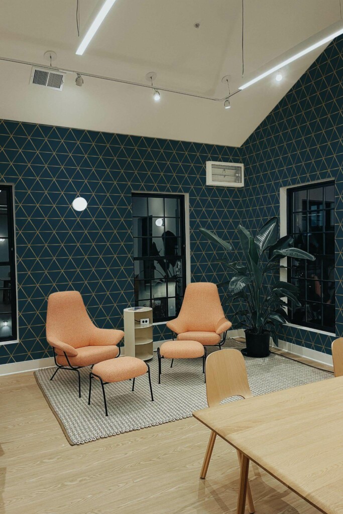 Minimal style living room decorated with Oxford blue geometric peel and stick wallpaper and mid-century style chairs