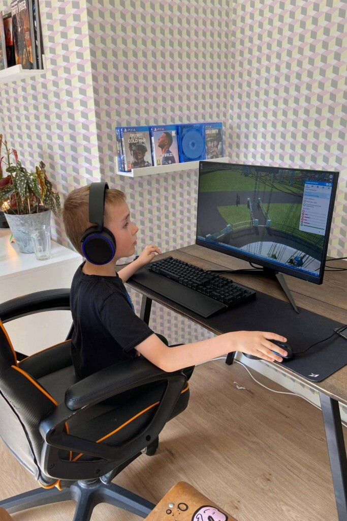 Scandinavian style gaming room decorated with Pastel cube peel and stick wallpaper