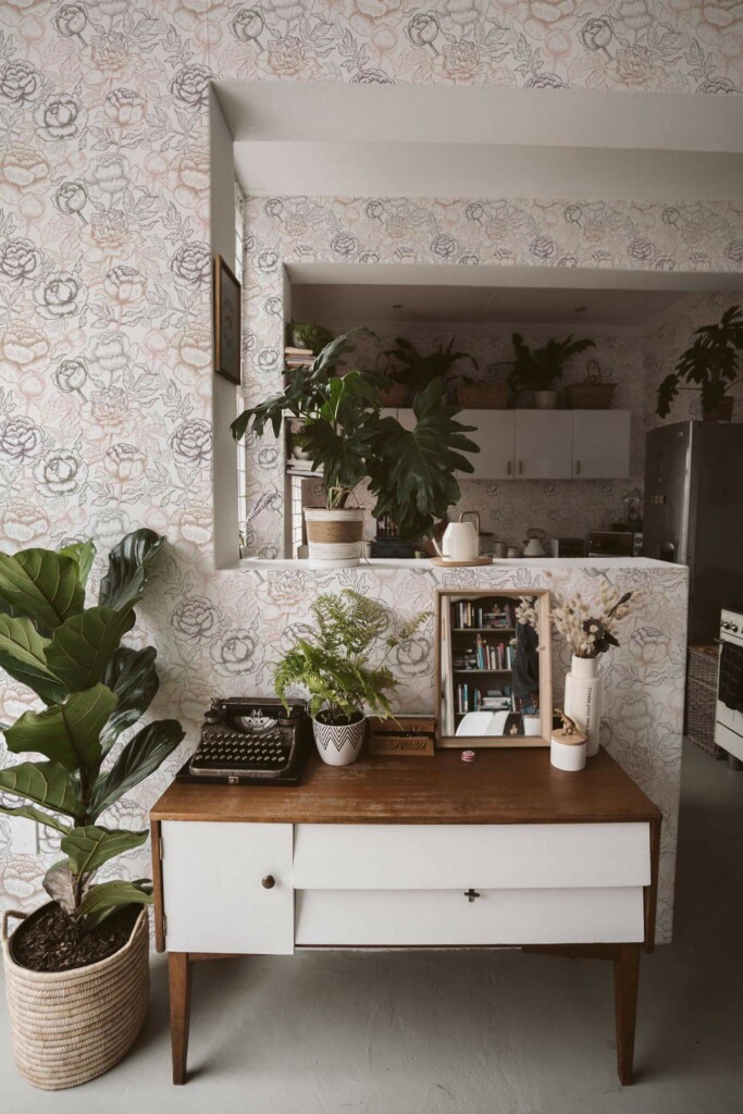Boho style living room and kitchen decorated with Pastel peony peel and stick wallpaper and green plants