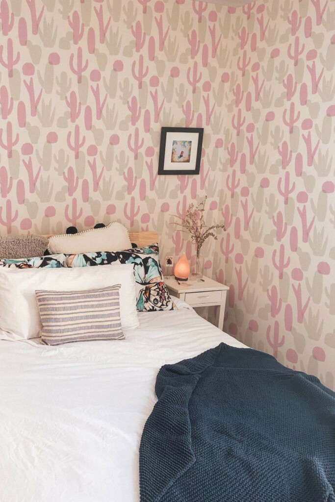 Minimal boho style bedroom decorated with Pink and beige cactus plant peel and stick wallpaper
