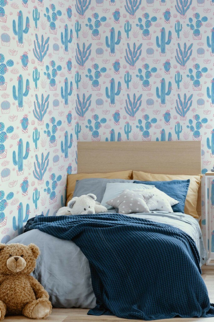 oastal style kids room decorated with Pink and blue cactus peel and stick wallpaper