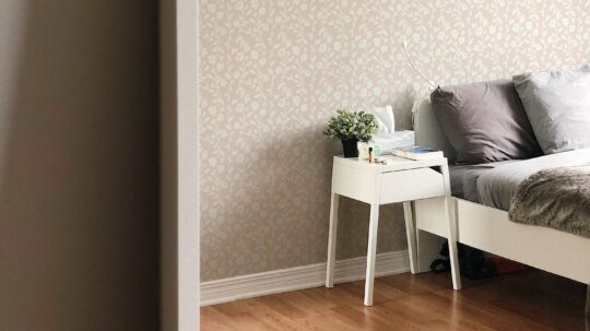 pink and white stick and peel wallpaper