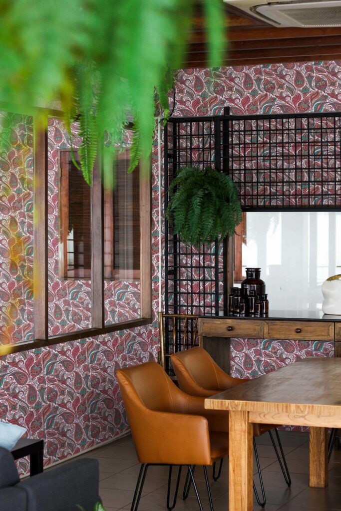 Mid-century modern style dining room decorated with Pink bold paisley peel and stick wallpaper and black industrial accents