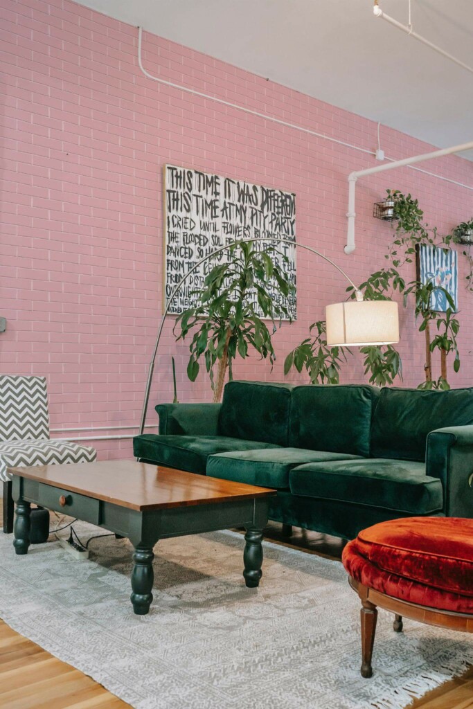 Bold eclectic style living room decorated with Pink bricks peel and stick wallpaper and emerald green sofa