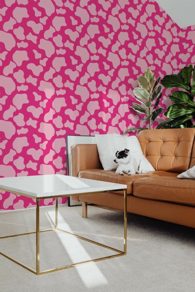 Mid-century modern style living room with dog on a sofa decorated with Pink cow pattern peel and stick wallpaper