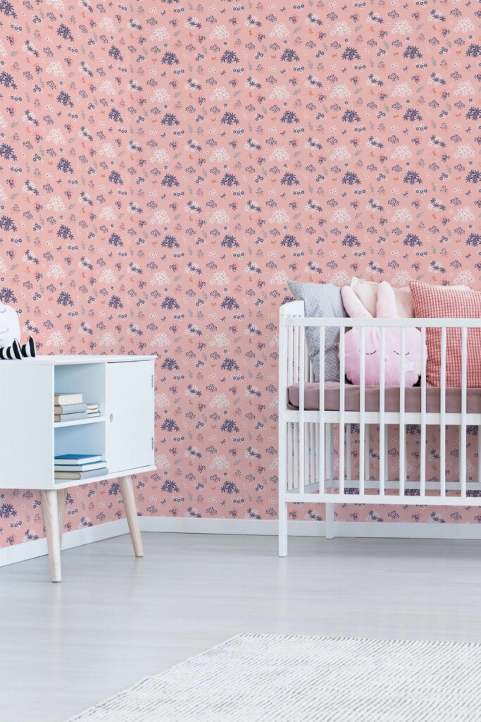 Minimal girly style nursery decorated with Pink floral peel and stick wallpaper